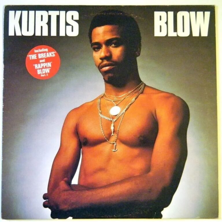 Capa do álbum de Kurtis Blow com o artista sem camisa e usando correntes.